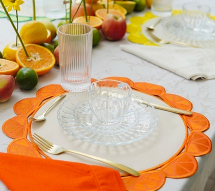 Individual reversible redondo en lona borde Naranjas Marfil