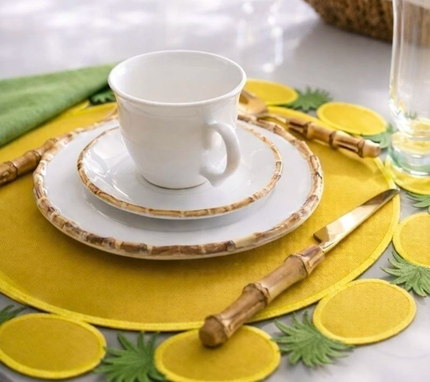 Individual reversible redondo en lona borde Piñas Marfil